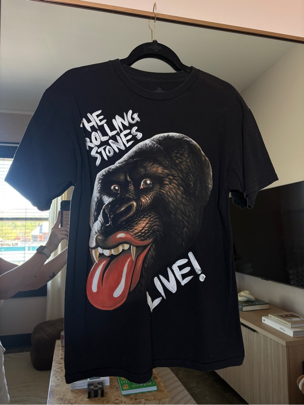 the Rolling Stones Black Graphic Tee with Gorilla Tongue Design